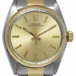 Rolex Oyster Perpetual 18k Yellow Gold/Steel Champagne Ladies 31mm Watch 6748