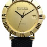 Tiffany & Co. Round ATLAS 18k Yellow Gold Champage Dial Manual Watch M6930