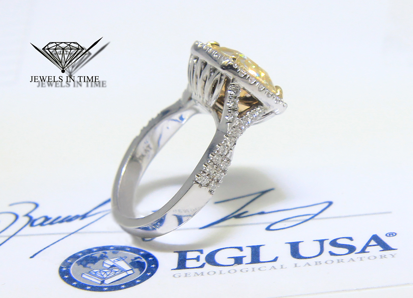 4.52 Carat Fancy Yellow Cushion Brilliant Diamond Platinum Ring Size 6.5 EGL USA 4.52 Carat Fancy Yellow Cushion Brilliant Diamond Platinum Ring Size 6.5 EGL USA