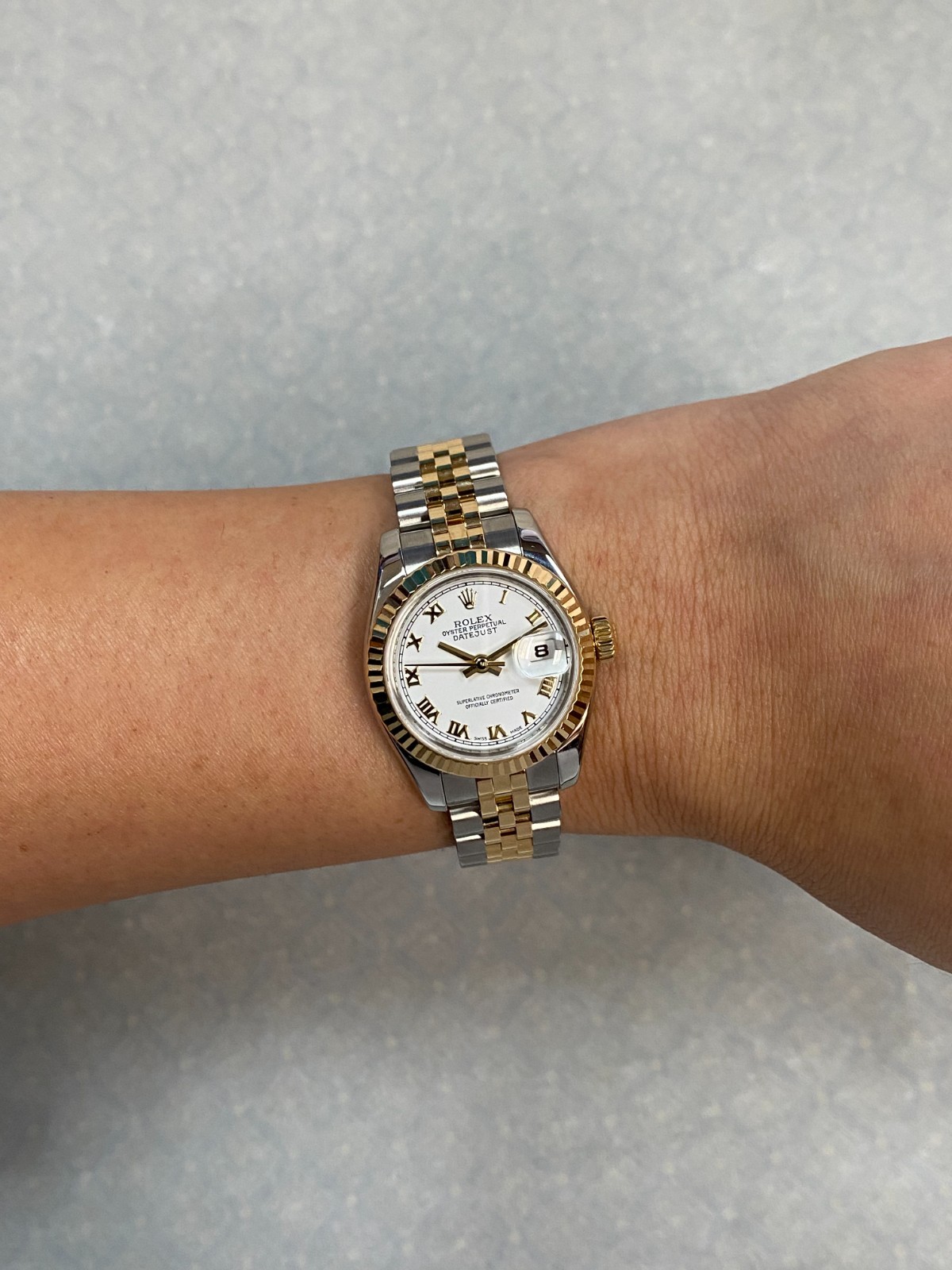 Rolex Datejust 18k Yellow Gold/Steel White Roman Dial Ladies 26mm Watch M 179173