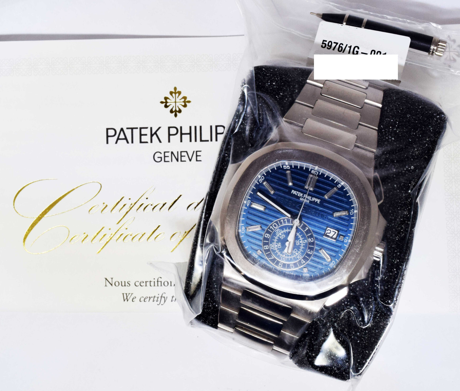 Patek Philippe SEALED Nautilus 18k White Gold Diamond Watch Box/Papers NEW 5976